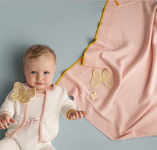 Knitted blanket with cornely butterfly