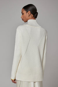 Knitted turtleneck with diagonal ribbed pattern